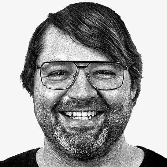 [Translate to Deutsch (Österreich):] Portraitbild des Referenten in schwarz-weiß, Georg Ostertag