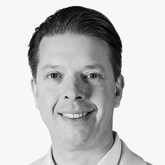 [Translate to Deutsch (Österreich):] Portraitbild des Referenten in schwarz-weiß, Mathias Uhlig