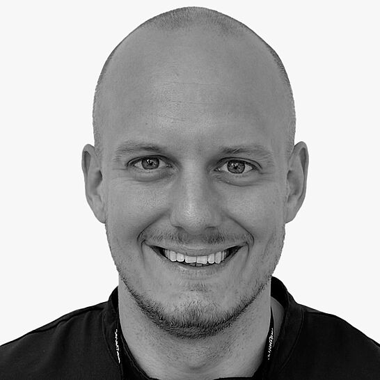 [Translate to Deutsch (Österreich):] Portraitbild des Referenten in schwarz-weiß, Dr. med. dent. Martin Hartmann