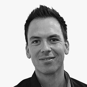 Portraitbild des Referenten in schwarz-weiß, Dr. Andreas Ritter